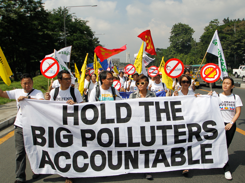 Petitioners including former Climate Change Commissioner, Yeb Sano, was among those present in demanding climate liability. Photo: AC Dimatatac