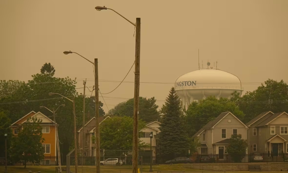 A photo of Kingston, Ontario showing the air polluted by wildfire smoke