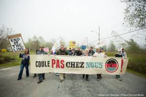 The group from Quebec, Coule Pas Chez Nous, marches in solidarity with the residents of Red Head, Saint John. On May 30, 2015, over 500 Canadian citizens and First Nations marched in Red Head, Saint John, at the End of the Line for the proposed Energy East pipeline. The people were protesting the proposed mega pipeline and the tank terminal that would destroy and the Red Head community and endanger the Bay of Fundy. If approved, TransCanada's Energy East pipeline would travel 4600km from Alberta to Saint John, New Brunswick, shipping 1.1 million barrels of crude oil and bitumen for export through the Bay of Fundy, a critical habit for Right whales and home to thousands of jobs in Tourism and Fishing.