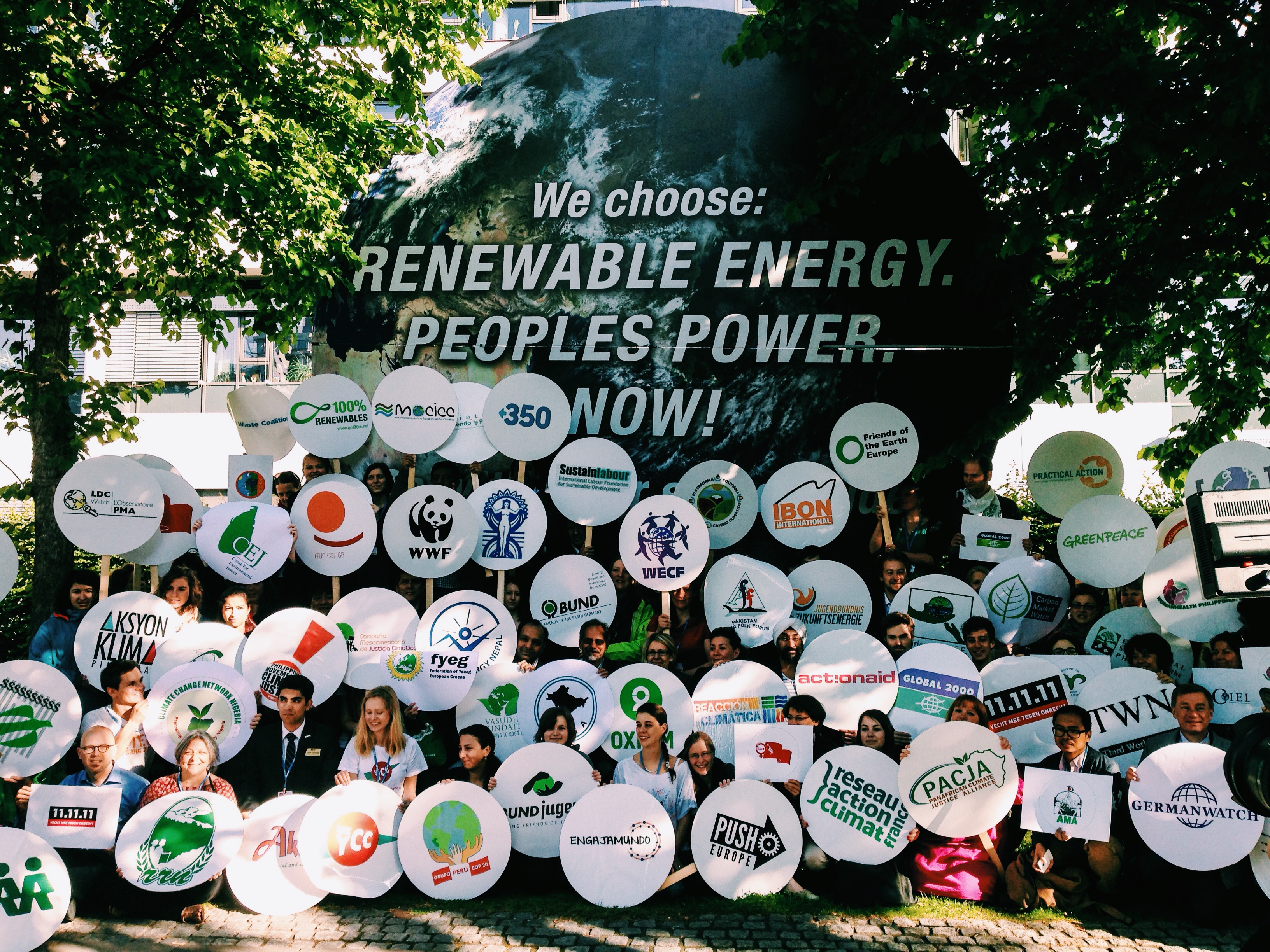 Civil Society organisations pictured outside the UN climate negotiations in Bonn today (Friday 6 June 2014) calling on governments to “stand with us or step aside”. Photo credit: Hoda Baraka