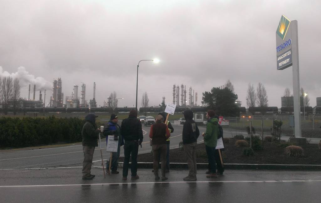 Members of Rising Tide Seattle and 350 Seattle bring food and lend support to striking workers in Anacortes, WA