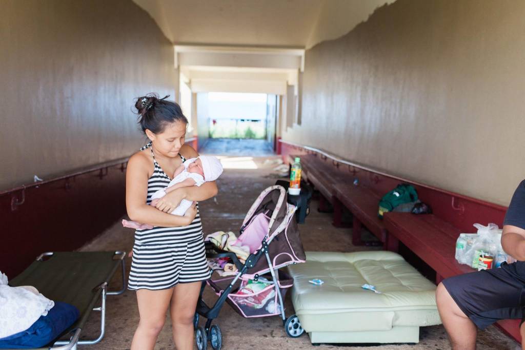 Baby and mother in shelter, Saipan