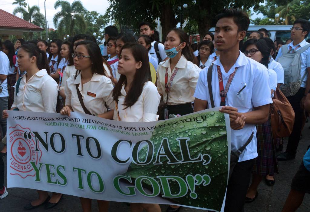 Students from Sacred Heart College of Lucena join the anti-coal march in Quezon.
