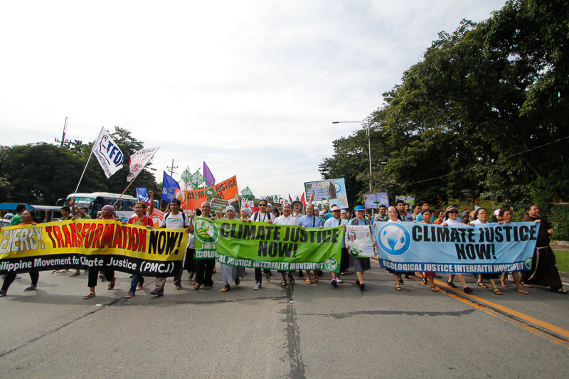 On the feast of St. Francis of Assissi church people, indigenous peoples, environmentalists, human rights advocates and social justice activists led by the Ecological Justice Interfaith Movement walk to demand climate justice as a lead up of activities that will amplify the voice of vulnerable countries like the Philippines in the upcoming climate talks in Paris in December 2015. Photo: AC Dimatatac