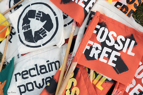 Fossil Free hand-painted signs and banners.