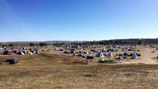 The view of Oceti Sakowin camp from "Facebook Hill" where the cell signal is strongest. Photo by Emily Jovais