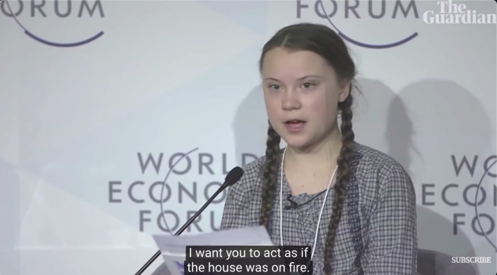 Greta Thunberg: "I want you to act as if the house was on fire". Photo by the Guardian.