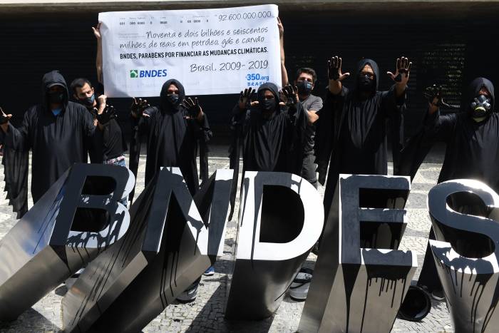 Activists outside BNDES headquarters in Brazil