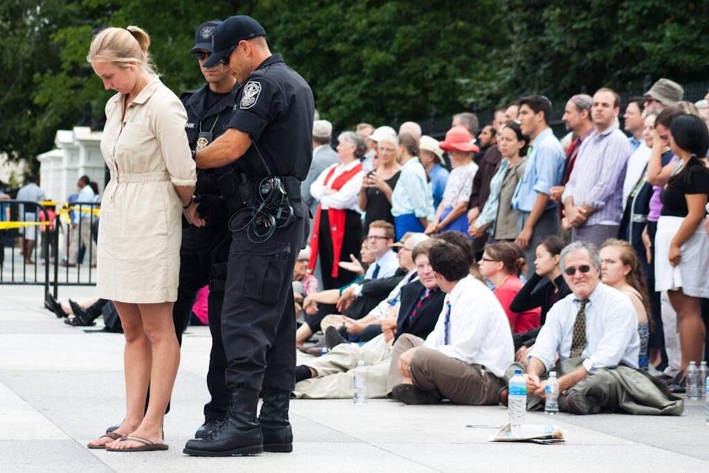 May Boeve, 350.org Executive Director, being arrested outside the White House for protesting against the Keystone XL pipeline.