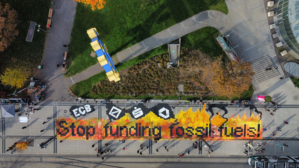 Our partner, Koala Kollektiv takes action outside the European Central Bank in Frankfurt, Germany calling for the central bank to stop funding fossil fuels and climate chaos