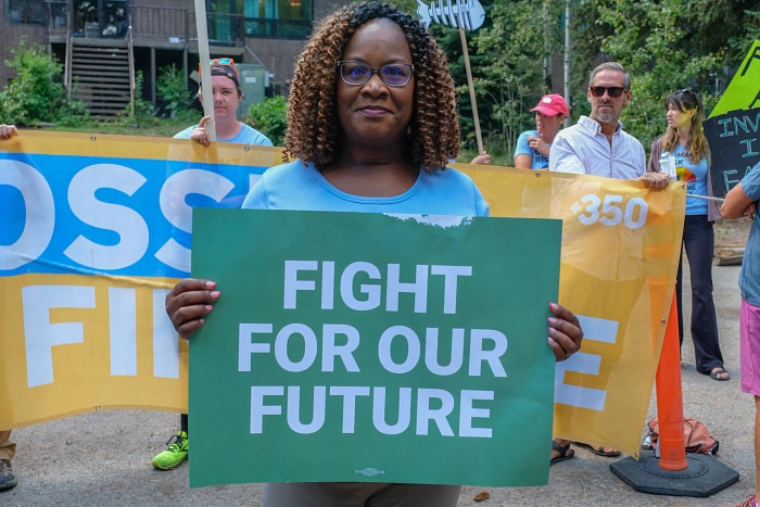 Activists protest at Jackson Hole Economic Symposium to deliver a message to the Federal Reserve: stop financing fossil fuels. Wyoming, US. Photo: Christian O'Rourke.